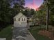 Charming split-level home with a two-car garage and lush landscaping, perfect for families seeking comfort at 169 Knights Ct, Dallas, GA 30157