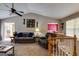 Cozy living room with vaulted ceilings, comfortable seating, and warm, inviting decor at 169 Knights Ct, Dallas, GA 30157