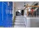 View from entryway showcasing the living room with a fireplace and access to upper level at 169 Knights Ct, Dallas, GA 30157