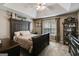 The primary bedroom offers ample space, a trey ceiling, and an ensuite bathroom at 169 Knights Ct, Dallas, GA 30157