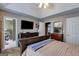 The main bedroom features a trey ceiling, walk through to the bathroom, and space for dressers at 169 Knights Ct, Dallas, GA 30157