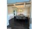 Elegant dining room with coffered ceilings and a stylish chandelier at 64 N Village Cir, Rydal, GA 30171