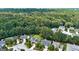 Overhead view showing homes nestled amongst lush greenery in a suburban neighborhood, providing a sense of community at 3953 Willow Fields Ct, Loganville, GA 30052