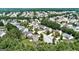 A high-angle aerial view showcases a well-planned suburban neighborhood, with neatly arranged houses at 3953 Willow Fields Ct, Loganville, GA 30052