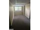 A basement with a window and drop ceiling at 4887 Winterview Ln, Douglasville, GA 30135