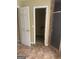 Functional bathroom layout showcasing tile flooring, shower, and closet access, maximizing space at 4887 Winterview Ln, Douglasville, GA 30135