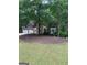 Lovely two-story home with a well-maintained lawn and a two-car garage at 4887 Winterview Ln, Douglasville, GA 30135