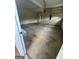 Uncluttered garage space with concrete flooring and a white door at 4887 Winterview Ln, Douglasville, GA 30135