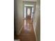 Inviting hallway featuring hardwood floors and natural light, offering a warm welcome to the home at 4887 Winterview Ln, Douglasville, GA 30135
