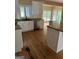 Bright kitchen with stainless steel appliances, granite countertops, and ample cabinet space at 4887 Winterview Ln, Douglasville, GA 30135