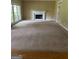 Large living room featuring a fireplace and a big window, perfect for relaxation and entertainment at 4887 Winterview Ln, Douglasville, GA 30135