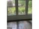 Sunroom featuring a window view of a fenced backyard with mature trees at 4887 Winterview Ln, Douglasville, GA 30135