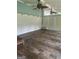 Bright sunroom with tiled floors and a view of the backyard at 4887 Winterview Ln, Douglasville, GA 30135