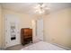 Bedroom with a closet, doors to other rooms, and wooden dresser at 161 Bradford Pl, Stockbridge, GA 30281