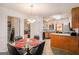 Charming breakfast nook with seating for four, a bright window, and convenient access to the kitchen at 161 Bradford Pl, Stockbridge, GA 30281