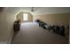 Large bonus room with neutral carpet and paint, a window and ceiling fan at 180 Cooper Rd, Social Circle, GA 30025