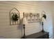 Living room showcases ship lap wall decor and decorative lamps at 180 Cooper Rd, Social Circle, GA 30025