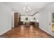 Spacious eat-in kitchen with stainless steel appliances and white cabinetry at 301 Retreat Way, Carrollton, GA 30116