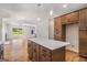 Kitchen island featuring cabinets and a white countertop at 301 Retreat Way, Carrollton, GA 30116