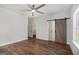 Main bedroom with a barn door leading to the main bathroom at 301 Retreat Way, Carrollton, GA 30116