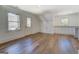 Bonus room featuring light wood floors, white walls, and natural light at 5106 N Pratt St, Covington, GA 30014