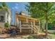 Charming home exterior with stone landscaping and spacious covered porch at 5106 N Pratt St, Covington, GA 30014