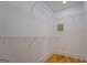Spacious walk-in closet with wire shelving and hardwood floors provides ample storage and organization at 5106 N Pratt St, Covington, GA 30014