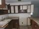 Outdated kitchen featuring upper cabinets, a sink, and a countertop at 2802 Ocean Valley Dr, South Fulton, GA 30349