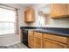 Bright kitchen featuring a window and an efficient layout with essential appliances at 6517 Snowbird Ln, Douglasville, GA 30134