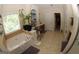 Bright bathroom featuring a large soaking tub, separate shower, and stylish vanity at 305 Matthew Cir, Stockbridge, GA 30252