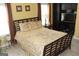 Comfortable bedroom with a large bed, wood flooring, and ample natural light at 305 Matthew Cir, Stockbridge, GA 30252