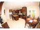 Spacious kitchen features stainless steel appliances, dark cabinets, granite counters, and breakfast area at 305 Matthew Cir, Stockbridge, GA 30252