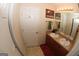 Bathroom with double sink vanity, neutral walls and flooring and white door at 305 Matthew Cir, Stockbridge, GA 30281