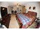 Spacious primary bedroom boasts a walk-in closet, ceiling fan, and comfortable queen size bed at 305 Matthew Cir, Stockbridge, GA 30281