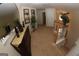 Second-floor hallway showcasing neutral-toned walls, staircase with white railings, and tasteful decor at 305 Matthew Cir, Stockbridge, GA 30281