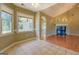Dining area featuring tile flooring and large windows for natural light at 1615 Clairmont Sw Ln, Conyers, GA 30094