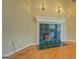 A fireplace with tile surround and a white mantel at 1615 Clairmont Sw Ln, Conyers, GA 30094