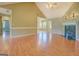 Spacious living room features hardwood floors, fireplace, and open floor plan at 1615 Clairmont Sw Ln, Conyers, GA 30094