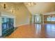 Cozy living area featuring a fireplace, hardwood floors, and lots of light at 1615 Clairmont Sw Ln, Conyers, GA 30094