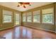 Bright sunroom with multiple windows and a door to the outside at 1615 Clairmont Sw Ln, Conyers, GA 30094