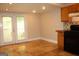 Spacious kitchen with access to the back deck, tile floor, cabinets, and stove at 1627 Orlando Sw St, Atlanta, GA 30311