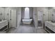 Beautiful bathroom with a soaking tub, a stand-up shower with a glass door, and dual vanities at 7910 Tintern Trce, Duluth, GA 30097
