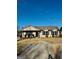 Charming single-story home featuring a well-maintained lawn, neutral siding, and a welcoming entrance at 415 Dove Ln, Social Circle, GA 30025