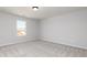 Neutral bedroom with carpet flooring and a single window view at 509 Altahama, Locust Grove, GA 30248