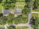 Aerial view of the property showcasing the home's location within a lush, tree-filled neighborhood at 708 Delanie Way, Stone Mountain, GA 30083