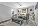 Elegant dining room with modern chandelier, stylish decor, and plenty of natural light at 708 Delanie Way, Stone Mountain, GA 30083