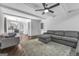 Spacious living room boasting an open floor plan, neutral tones, and seamlessly connects to the kitchen at 708 Delanie Way, Stone Mountain, GA 30083