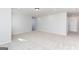 Bonus room featuring neutral carpet and access to stairs at 714 Ocmulgee Crossing, Locust Grove, GA 30248