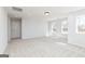 Bonus room featuring neutral carpet and plenty of natural light at 714 Ocmulgee Crossing, Locust Grove, GA 30248