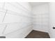 Walk-in closet complete with wire shelving providing ample storage in a simple yet effective design at 714 Ocmulgee Crossing, Locust Grove, GA 30248